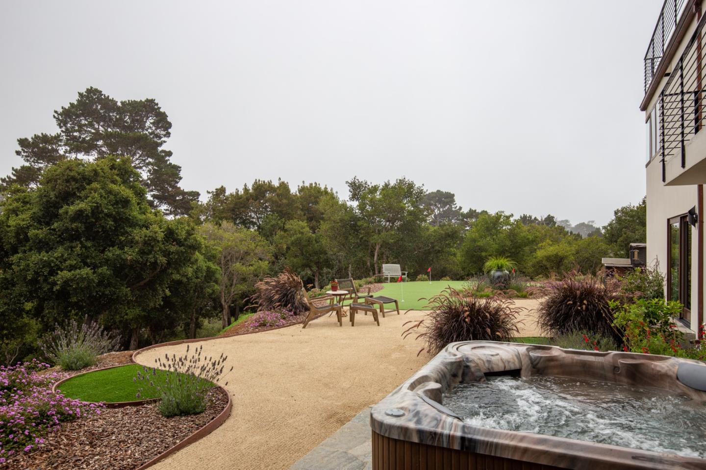 3292 Martin Road Carmel, CA 93923 - Photo 27 of 27 a view of a backyard with swimming pool and sitting area