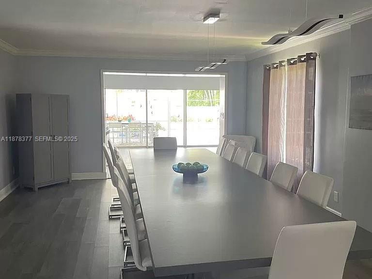 1319 Fillmore Street Hollywood, FL 33019 - Photo 2 of 15 a view of a dining room with furniture and window