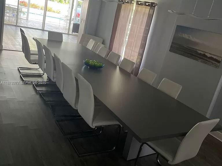 1319 Fillmore Street Hollywood, FL 33019 - Photo 3 of 15 a view of entryway and hall with wooden floor