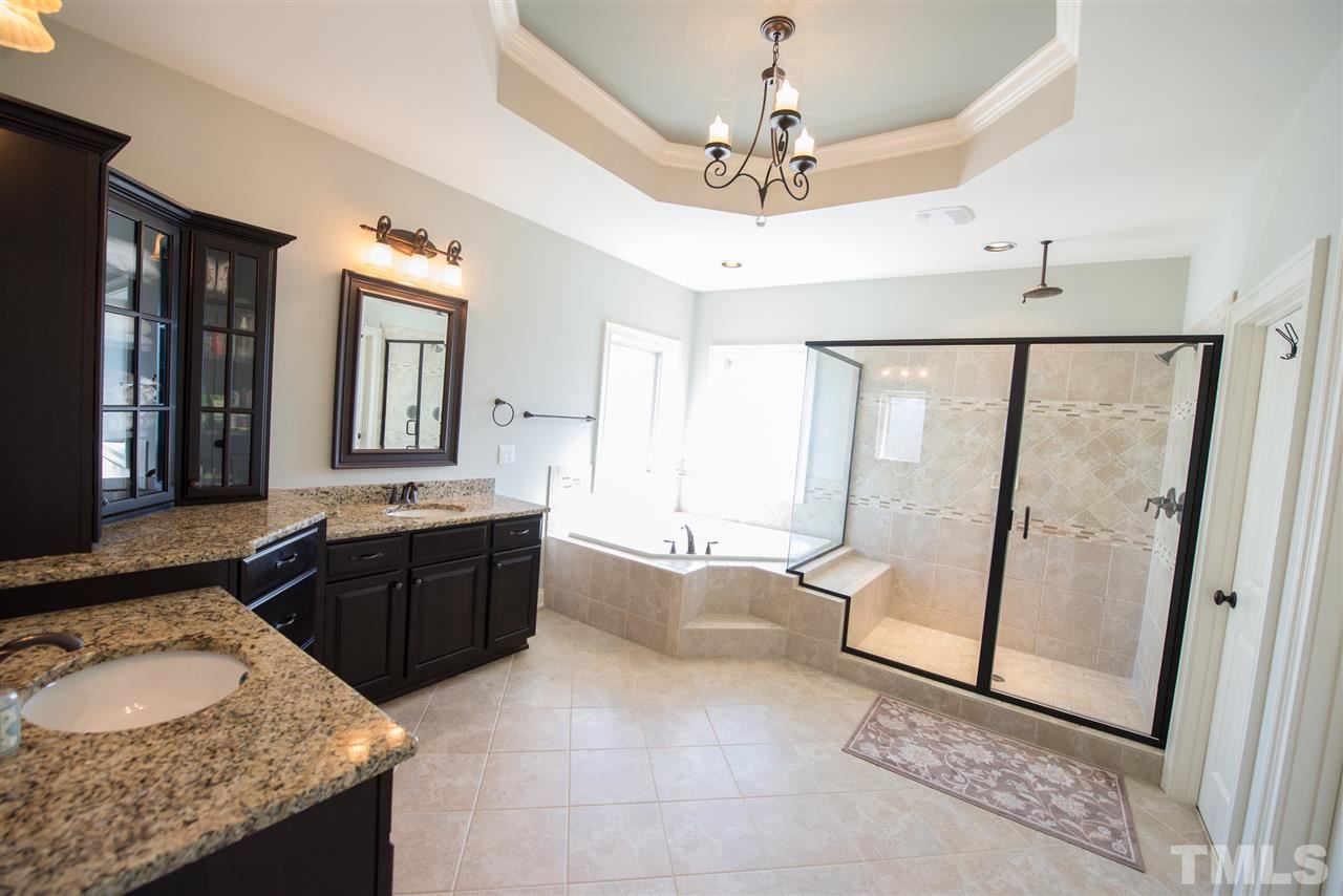 2830 Winter Song Road Raleigh, NC 27614 - Photo 16 of 25 Whirlpool tub and check out the trey-ceiling and beautiful drop lighting