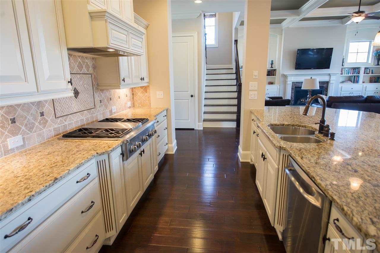 2830 Winter Song Road Raleigh, NC 27614 - Photo 6 of 25 Chef's dream with tile back-splash, gas range, and counter-top space galore!
