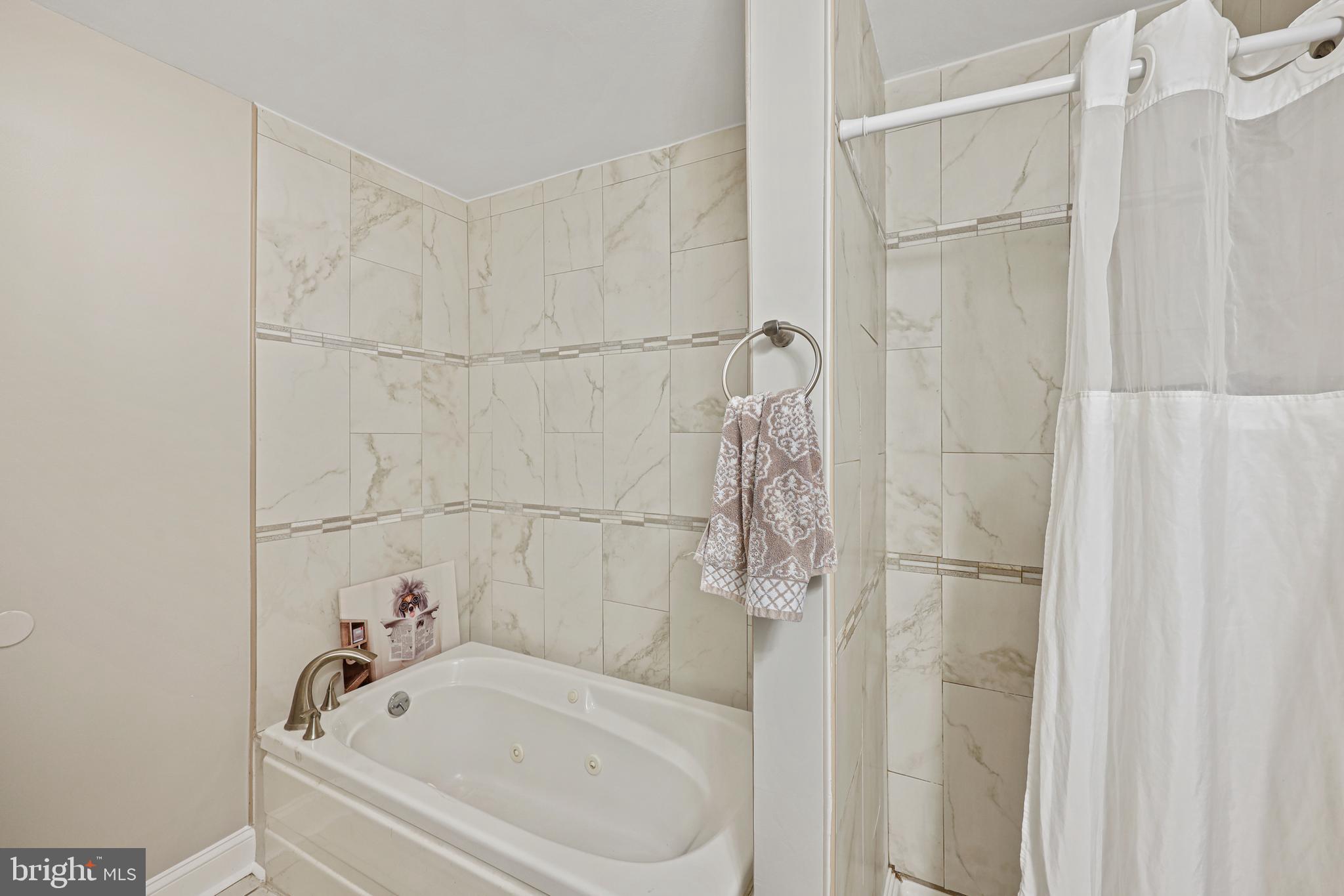 3420 Kimble Road Windsor Mill, MD 21244 - Photo 15 of 28 Main Level Full Bath w/ Stand-Up Shower