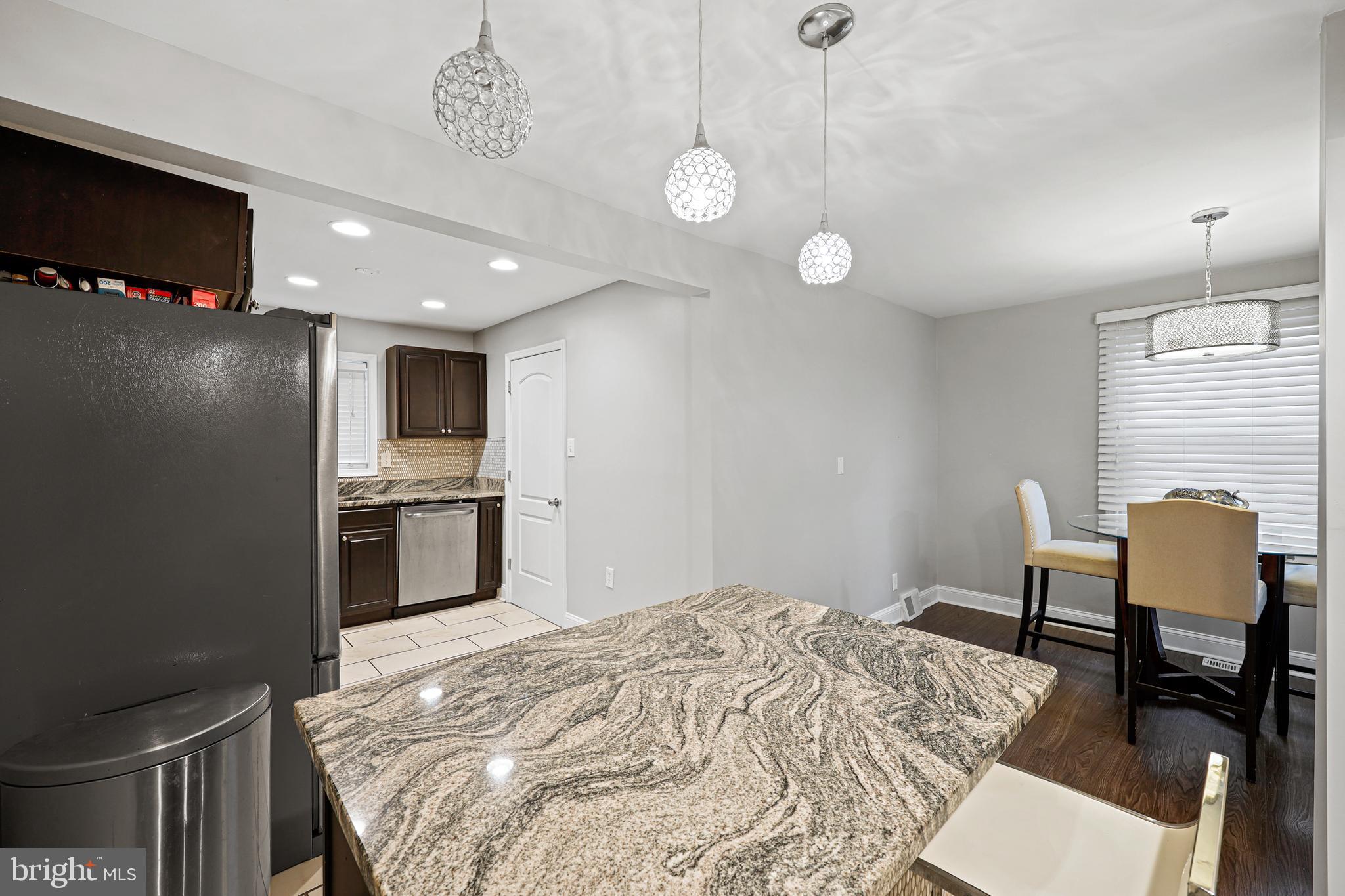 3420 Kimble Road Windsor Mill, MD 21244 - Photo 3 of 28 Open Concept Kitchen and Dining