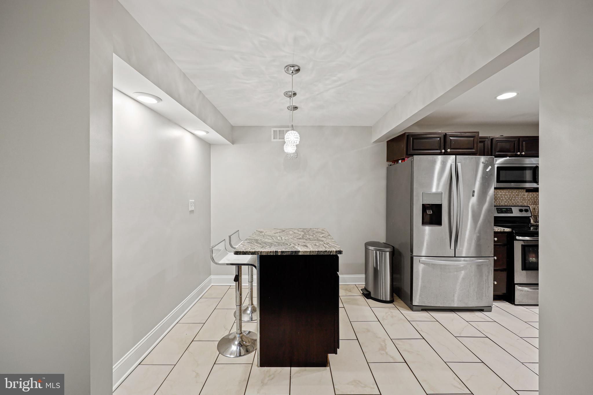 3420 Kimble Road Windsor Mill, MD 21244 - Photo 4 of 28 Kitchen w/ Breakfast Bar