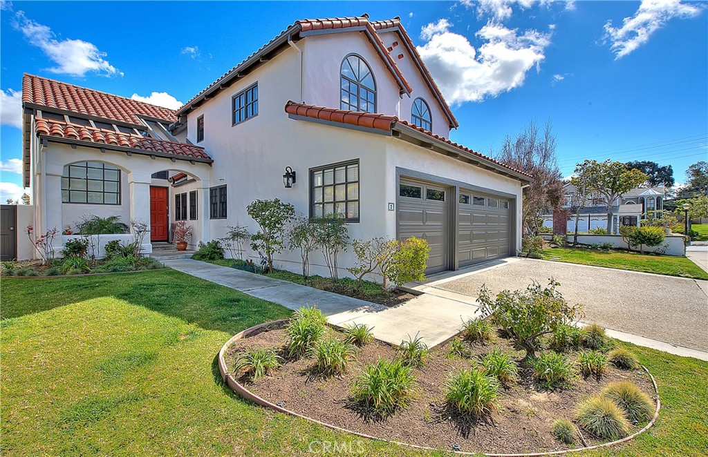 a house view with a garden space