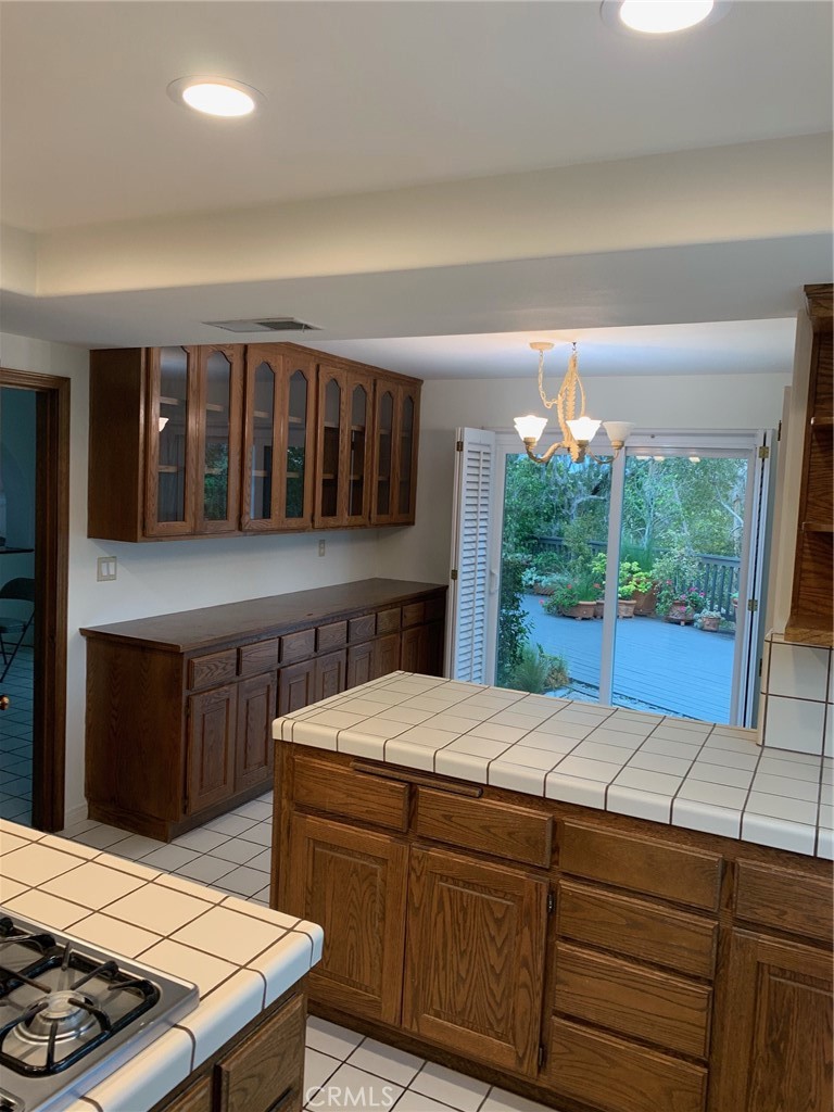 2 Cambridge Manhattan Beach, CA 90266 - Photo 15 of 18 a bedroom with a bed and a large window