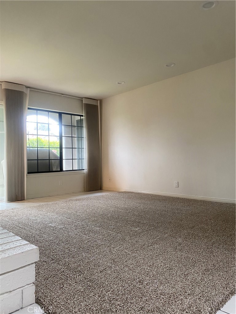 2 Cambridge Manhattan Beach, CA 90266 - Photo 4 of 18 a view of an empty room with a fireplace