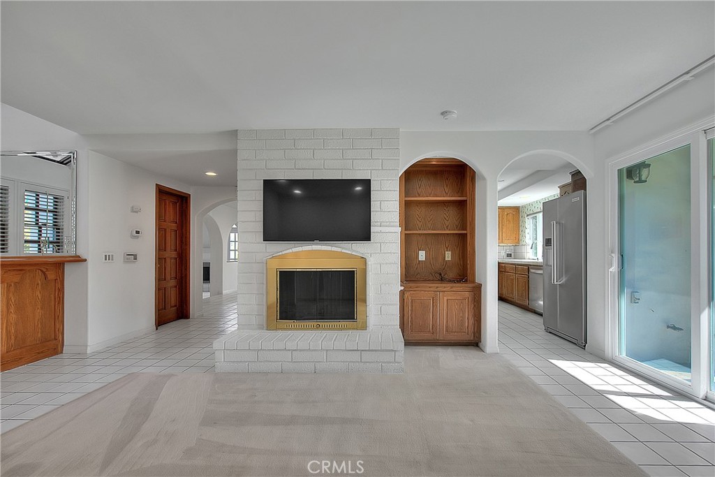 2 Cambridge Manhattan Beach, CA 90266 - Photo 5 of 18 a view of an empty room fire place and a fireplace