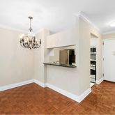 a bedroom with a bed and a television in it