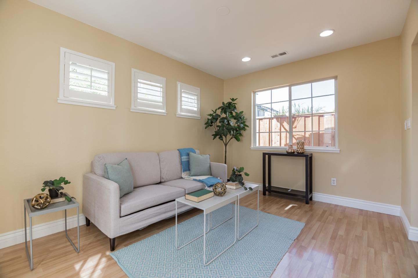 933 Coventry Way Milpitas, CA 95035 - Photo 13 of 30 a living room with furniture and a window