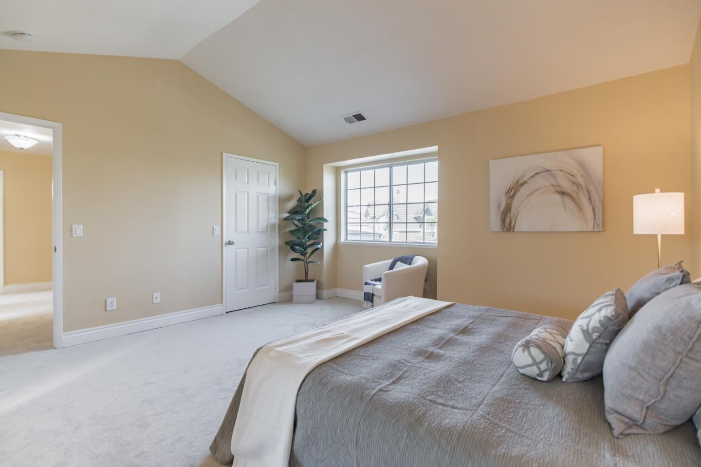 933 Coventry Way Milpitas, CA 95035 - Photo 20 of 30 a bedroom with a bed and a window