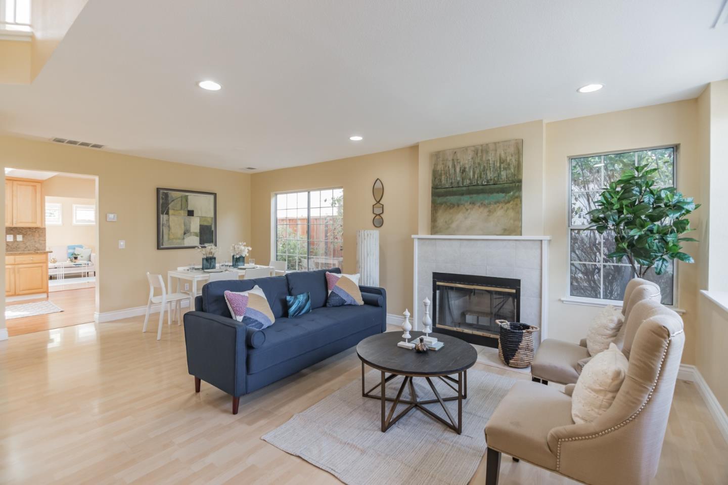 933 Coventry Way Milpitas, CA 95035 - Photo 3 of 30 a living room with furniture and a fireplace