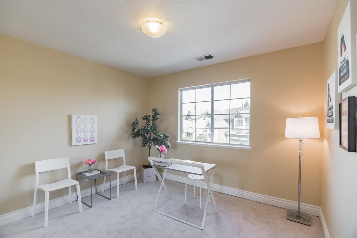 933 Coventry Way Milpitas, CA 95035 - Photo 23 of 30 a living room with furniture and a window