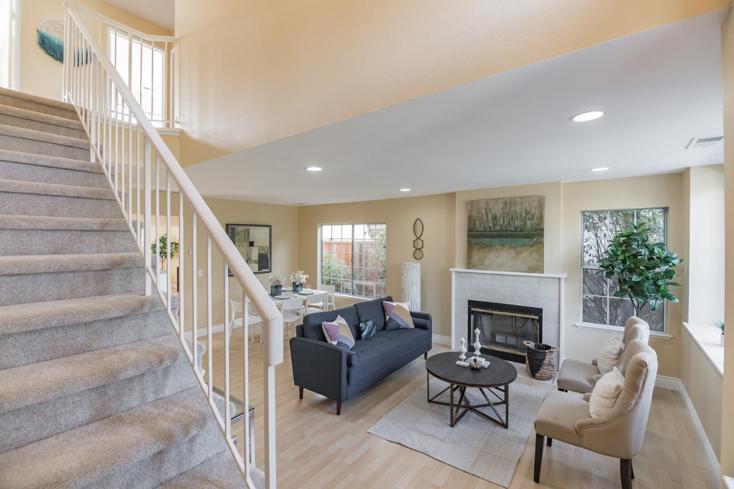 933 Coventry Way Milpitas, CA 95035 - Photo 7 of 30 a living room with furniture and a fireplace