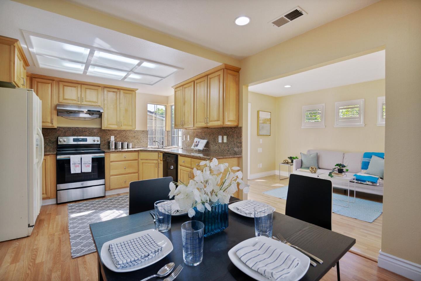 933 Coventry Way Milpitas, CA 95035 - Photo 8 of 30 a living room with furniture and kitchen view