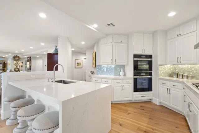 a view of chairs and table in patio