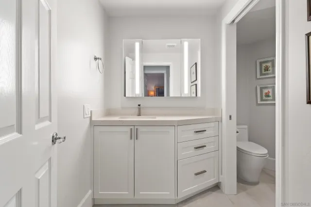 a view of parking garage with cars parked