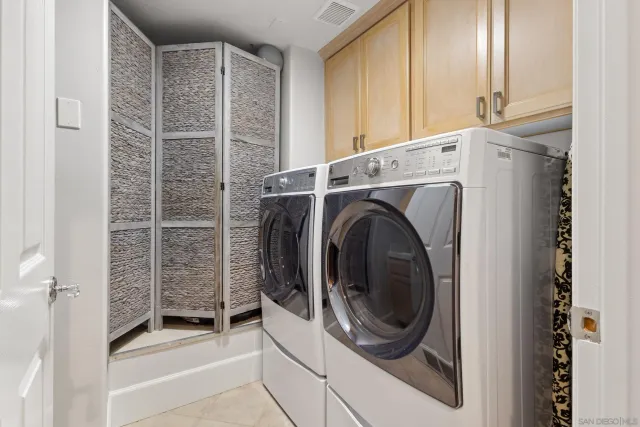 a view of multiple houses with a yard