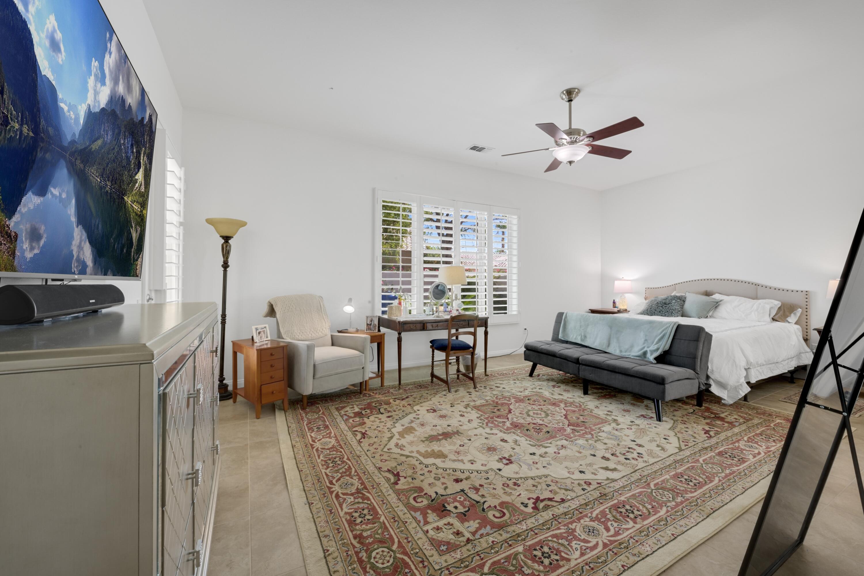 40092 Calle San Geronimo Indio, CA 92203 - Photo 17 of 48 a living room with furniture and a window