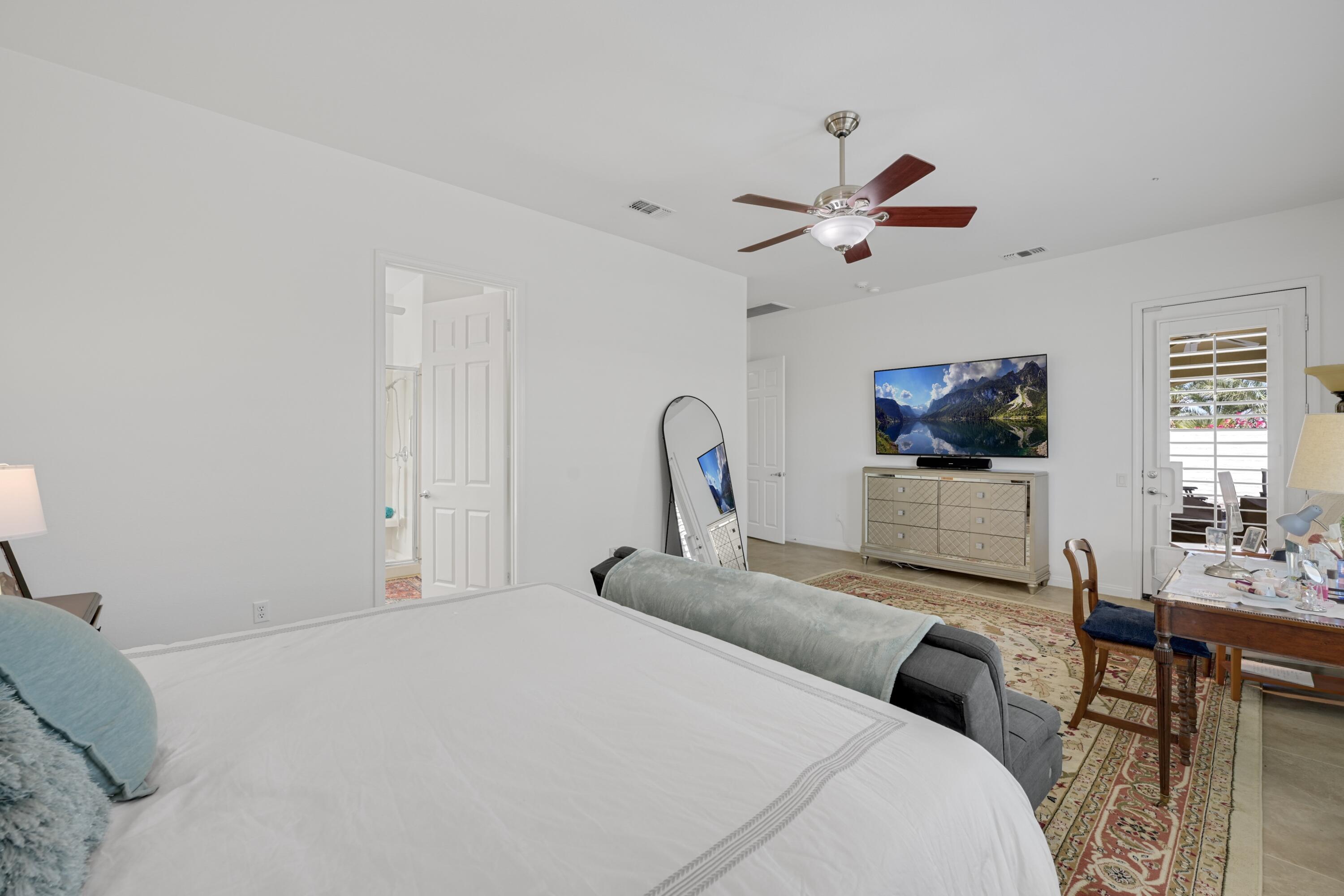 40092 Calle San Geronimo Indio, CA 92203 - Photo 19 of 48 a bedroom with a bed and a dresser