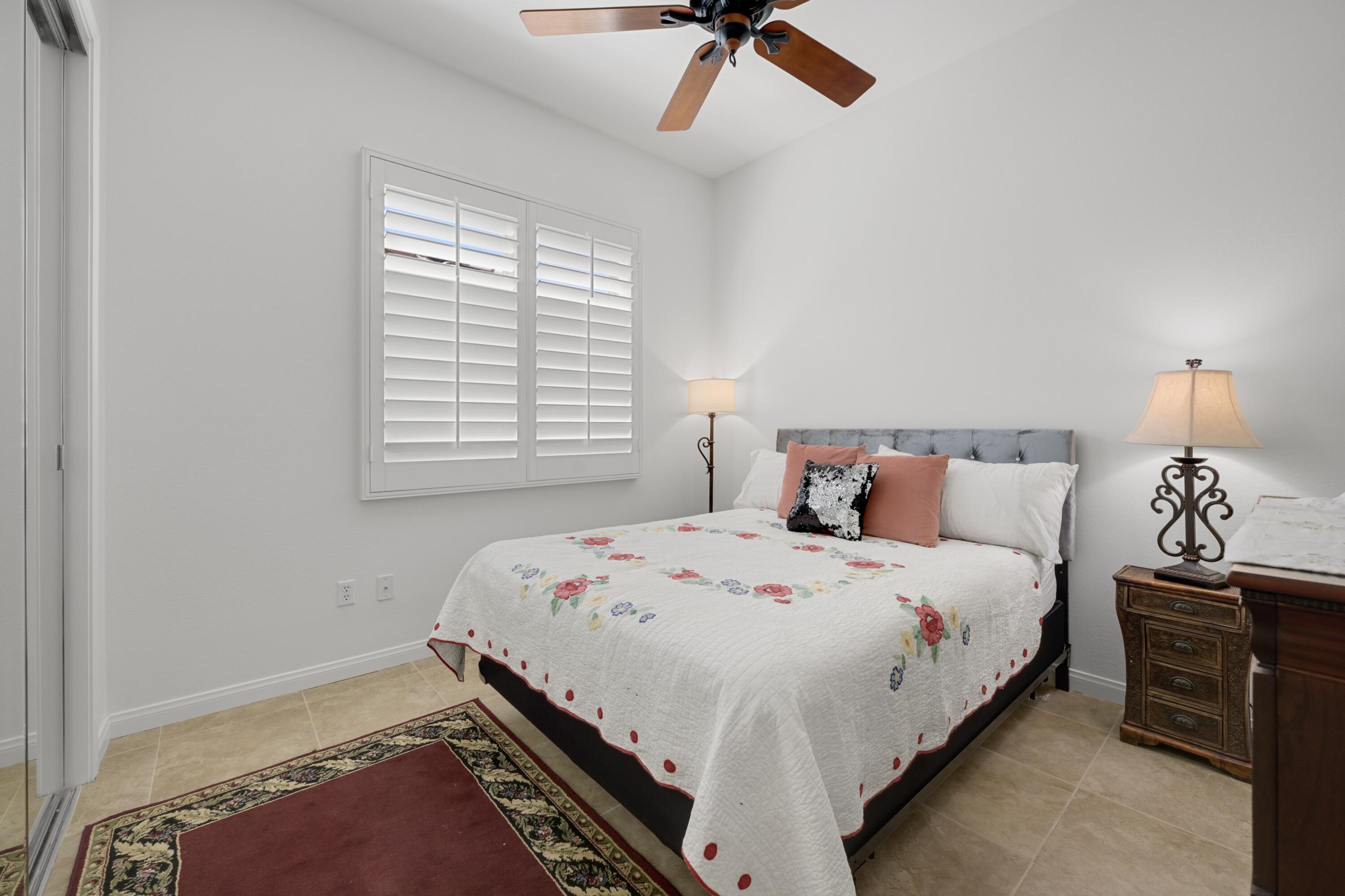40092 Calle San Geronimo Indio, CA 92203 - Photo 22 of 48 a bed room with a bed and a night stand