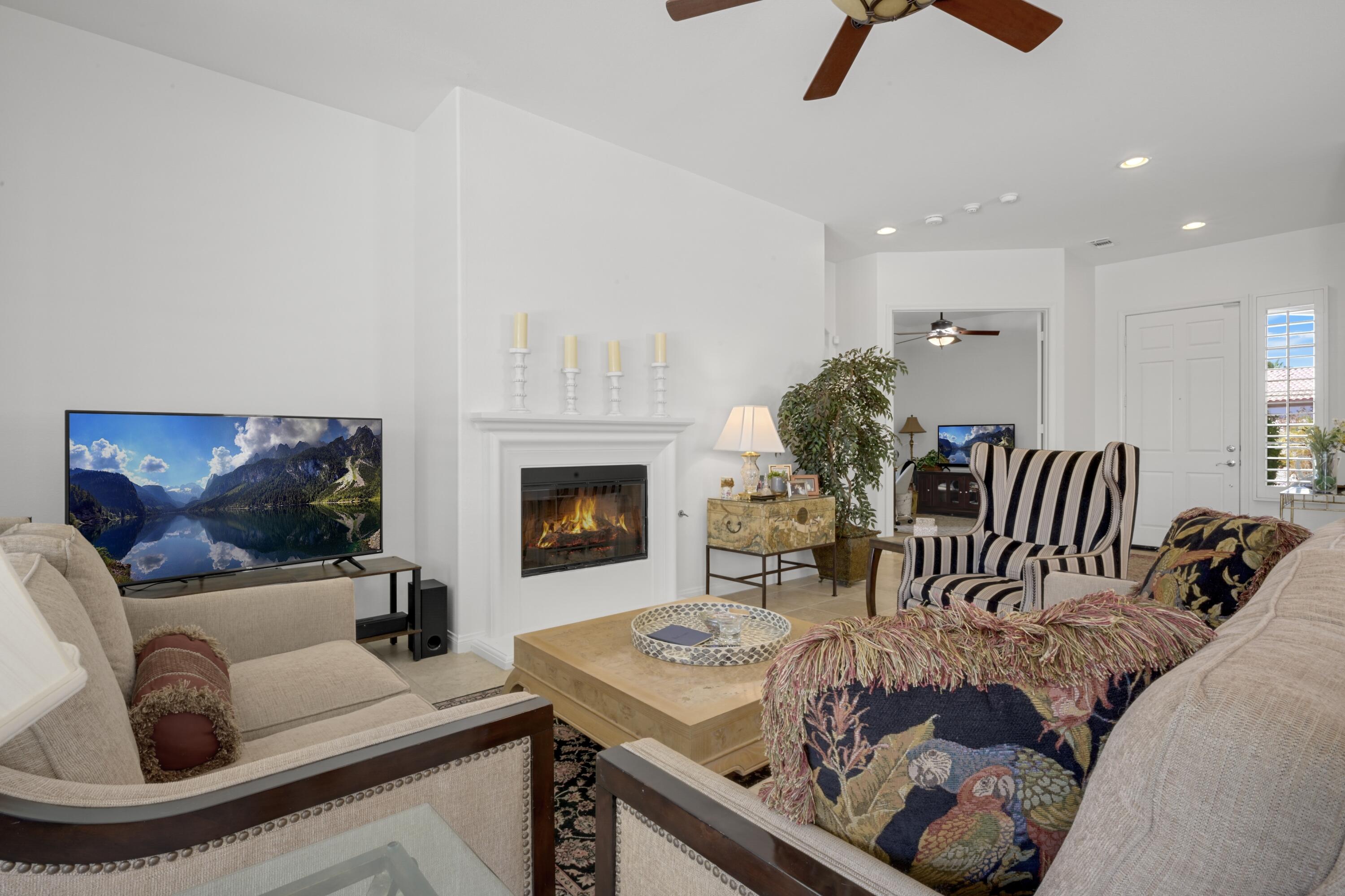 40092 Calle San Geronimo Indio, CA 92203 - Photo 3 of 48 a living room with furniture and a fireplace