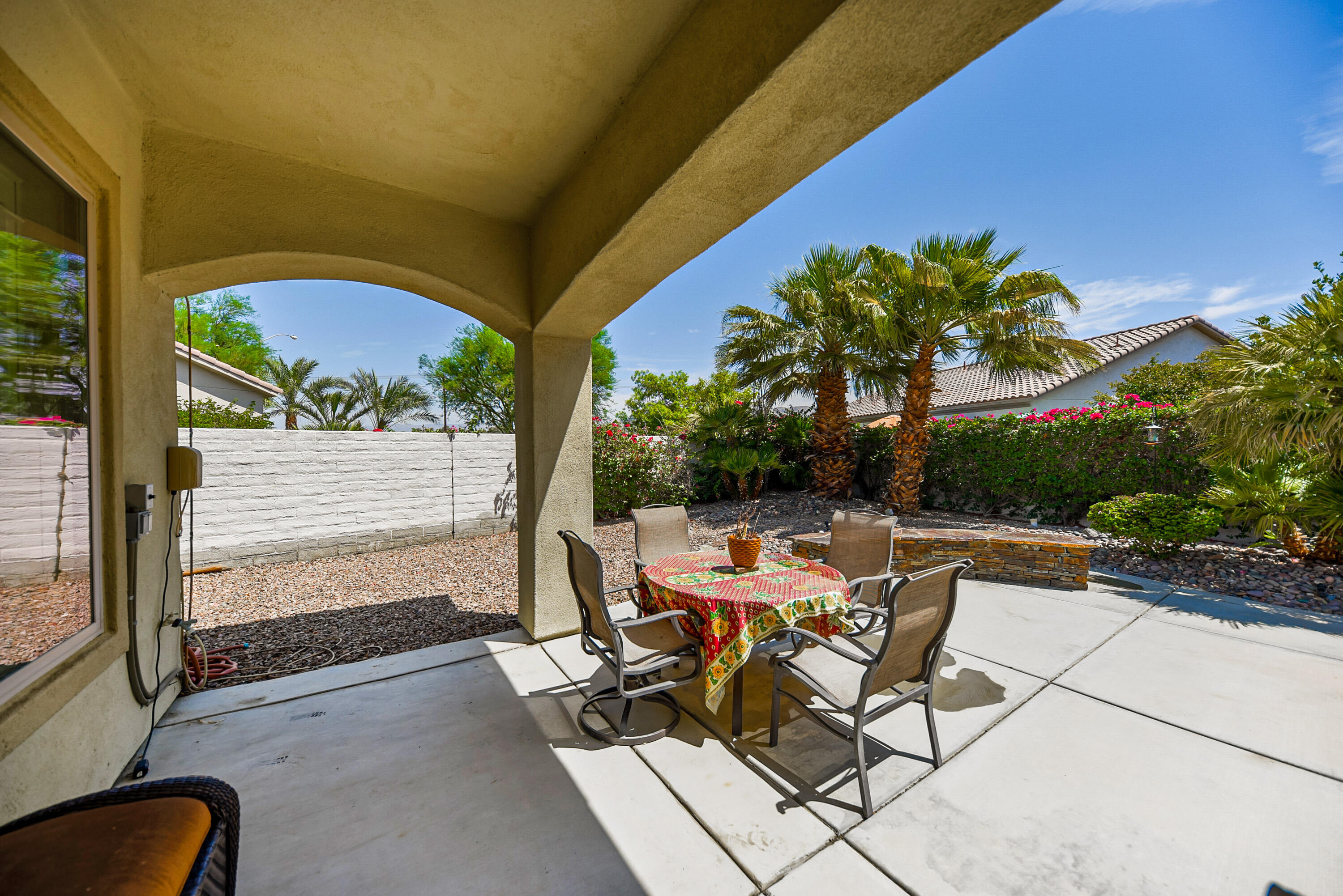 40092 Calle San Geronimo Indio, CA 92203 - Photo 37 of 48 a view of a chairs and table in backyard