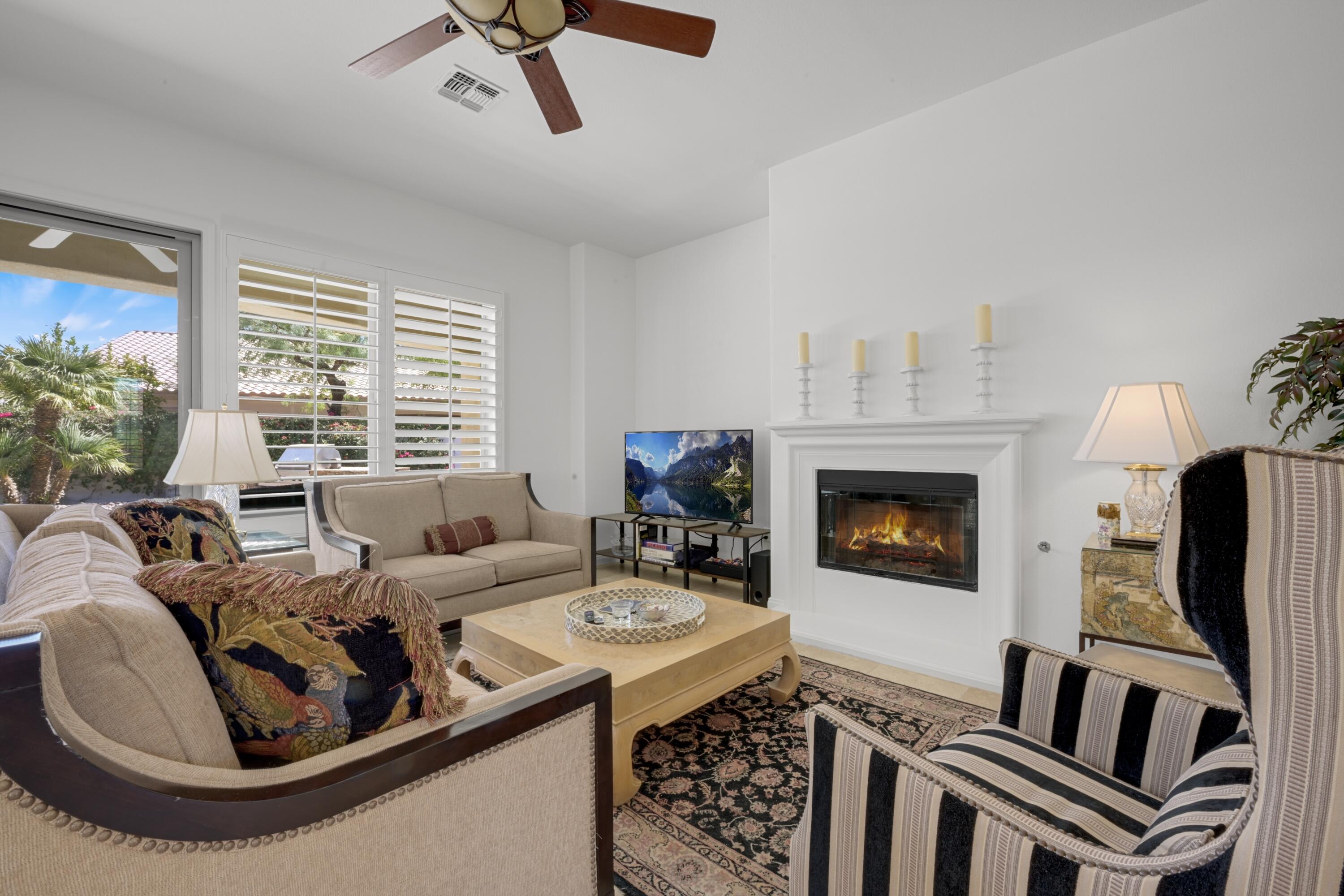 40092 Calle San Geronimo Indio, CA 92203 - Photo 5 of 48 a living room with furniture and a fireplace