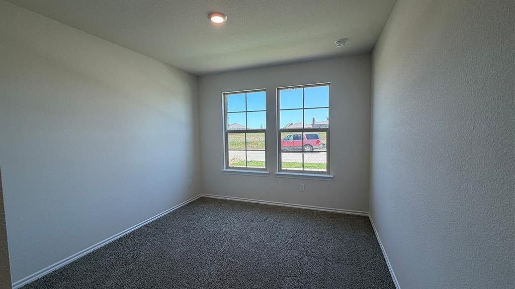 2007 Reveille Way Terrell, TX 75160 - Photo 9 of 31 an empty room with a window