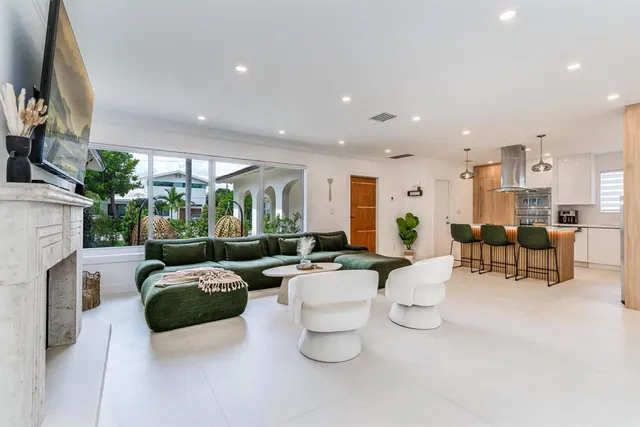 a view of entryway with wooden floor and workspace