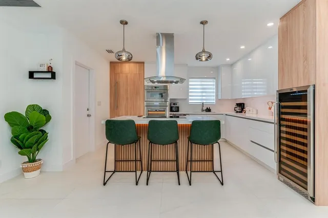 a view of a swimming pool with a patio