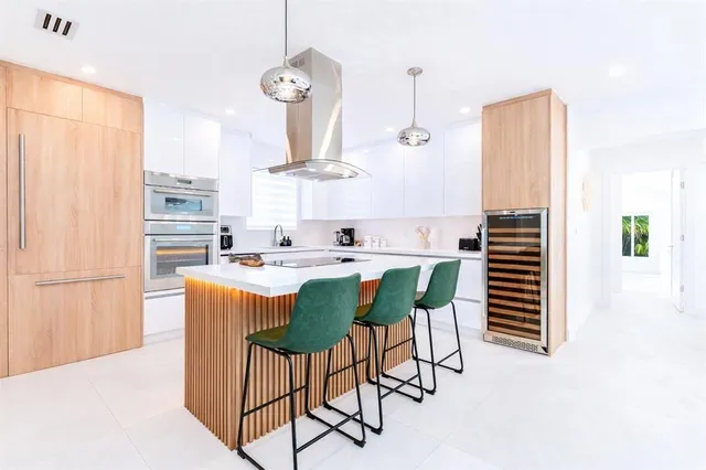 a view of backyard with wheel chair potted plants and palm trees