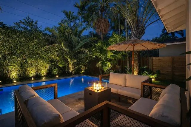 a view of a back yard of the house