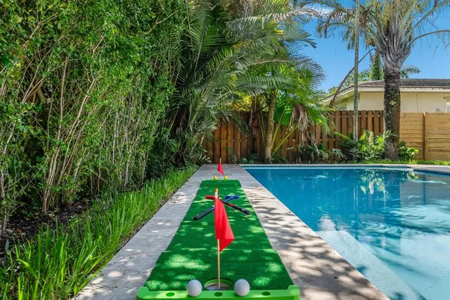 a view of a entryway with flower pots