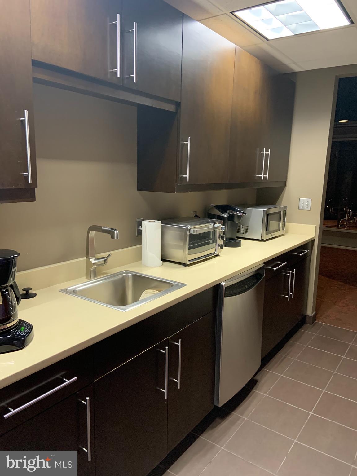 1200 Steuart Street, Unit 520 Baltimore, MD 21230 - Photo 22 of 49 Community kitchen in game room