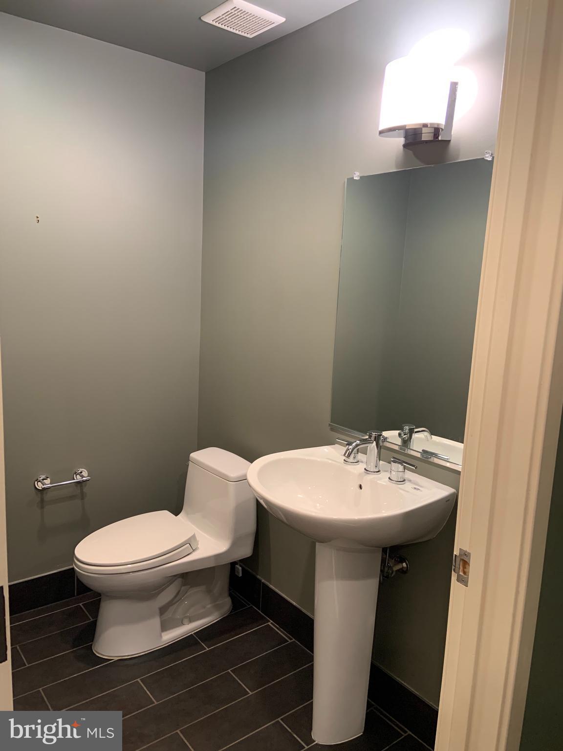 1200 Steuart Street, Unit 520 Baltimore, MD 21230 - Photo 8 of 49 Half bathroom