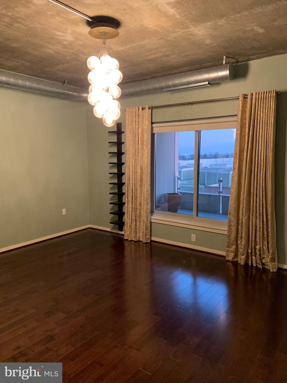 1200 Steuart Street, Unit 520 Baltimore, MD 21230 - Photo 9 of 49 Beautiful bedroom with custom lighting