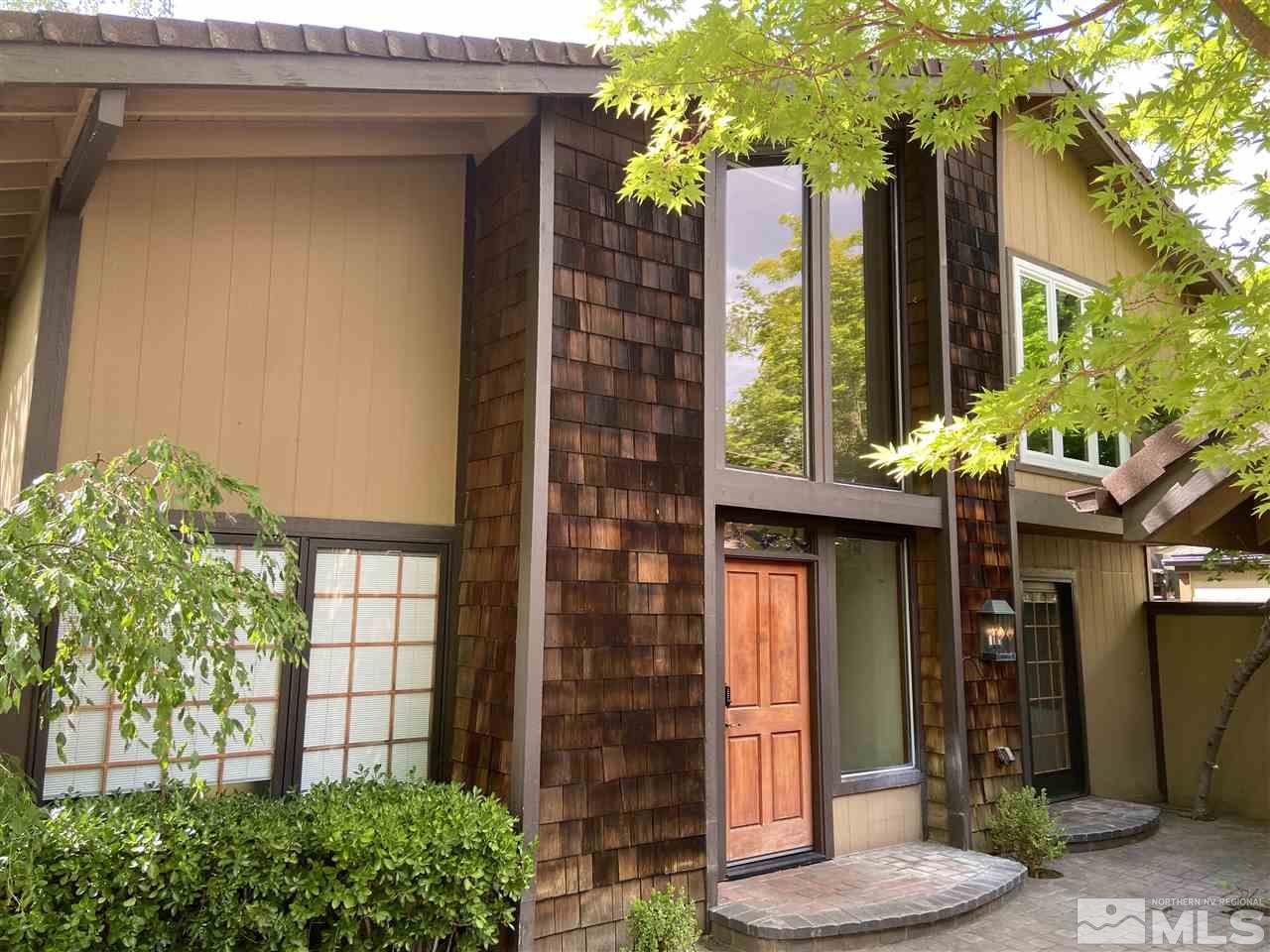 a front view of a house with a porch