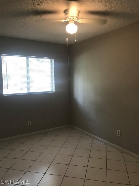 2316 Caladium Road Fort Myers, FL 33905 - Photo 14 of 18 an empty room with a window