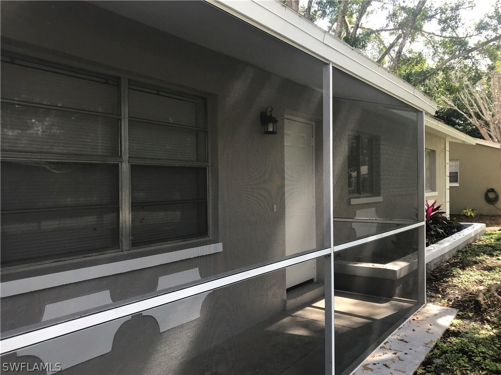 2316 Caladium Road Fort Myers, FL 33905 - Photo 3 of 18 a view of a door and a window