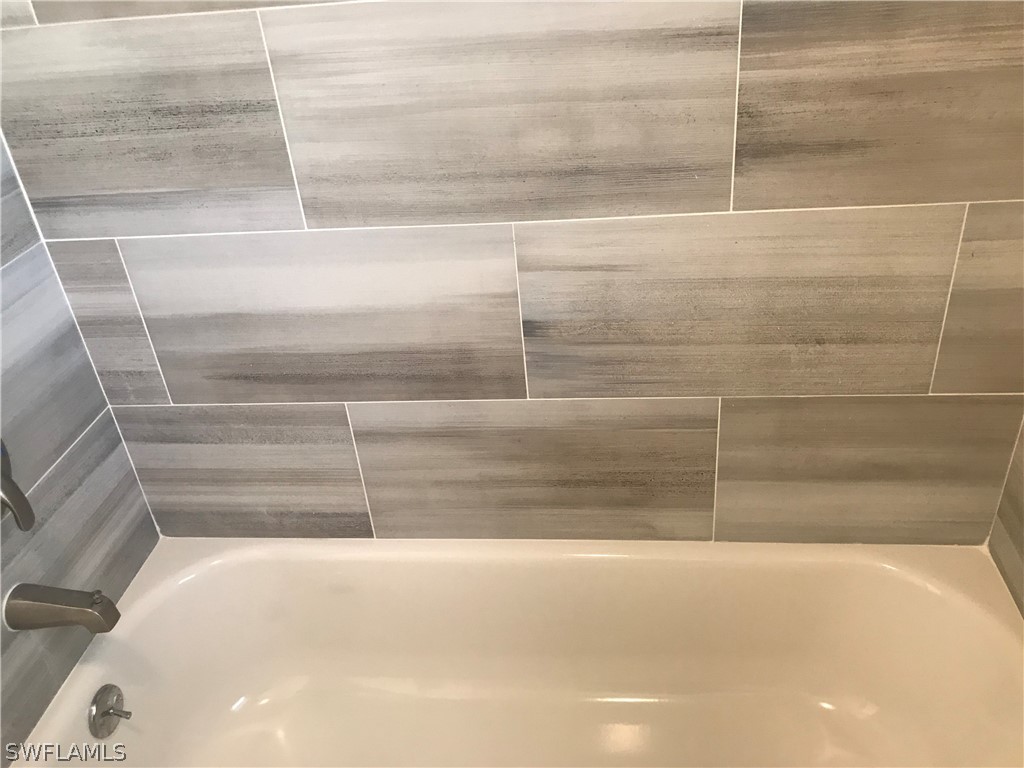 2316 Caladium Road Fort Myers, FL 33905 - Photo 10 of 18 a close up of a bathtub