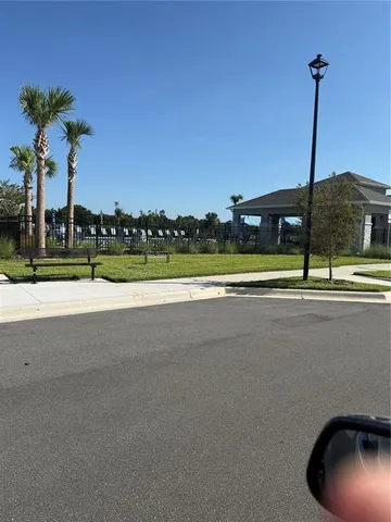 a park view with a garden and slide