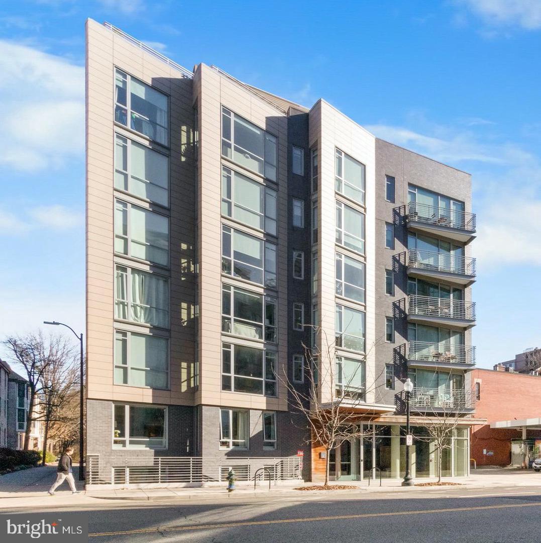 1311 13th Street Northwest, Unit T05 Washington, DC 20005 - Photo 2 of 17 a front view of a multi story building