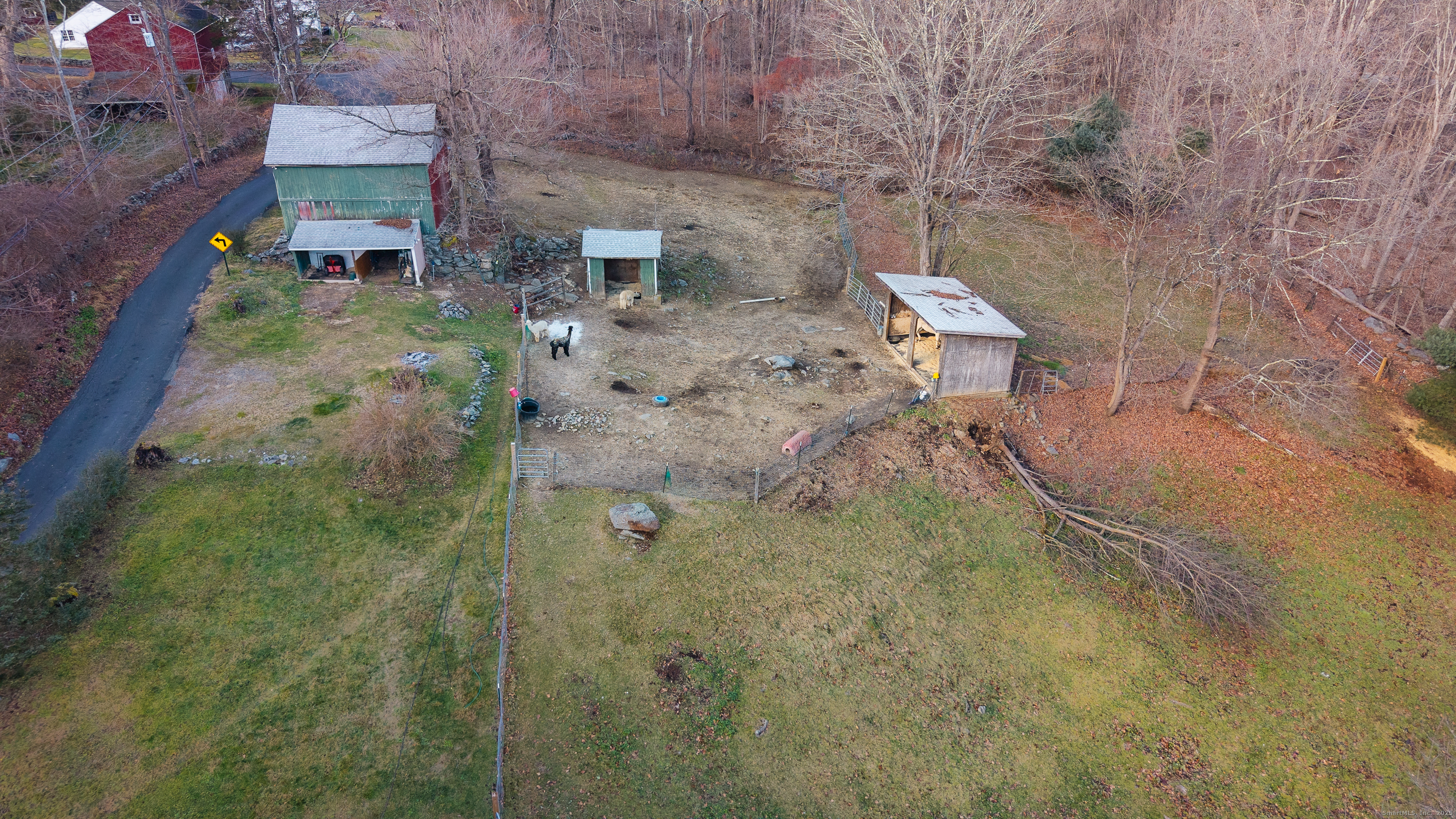 2 Stony Brook Road Newtown, CT 06470 - Photo 19 of 29 a aerial view of a house with a yard