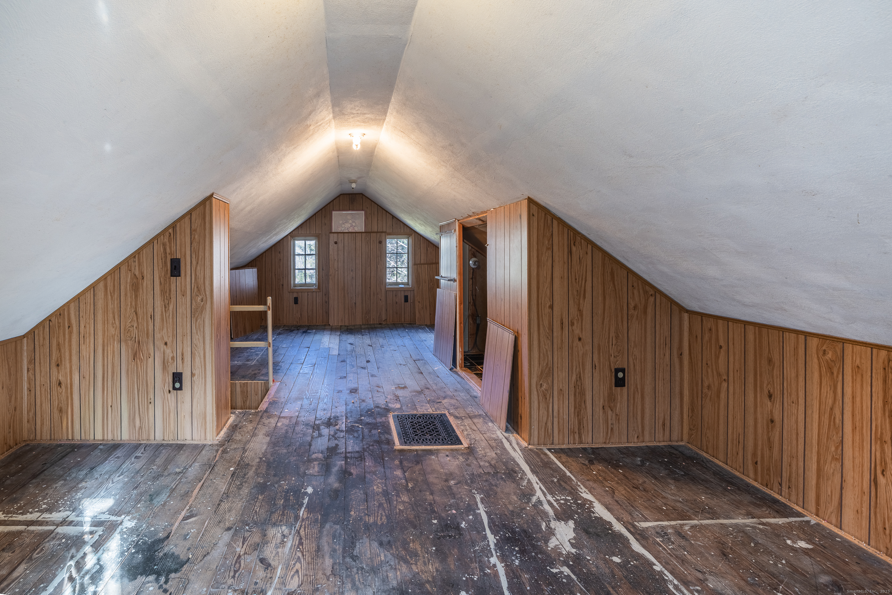 2 Stony Brook Road Newtown, CT 06470 - Photo 24 of 29 a view of a hallway with wooden walls and entryway