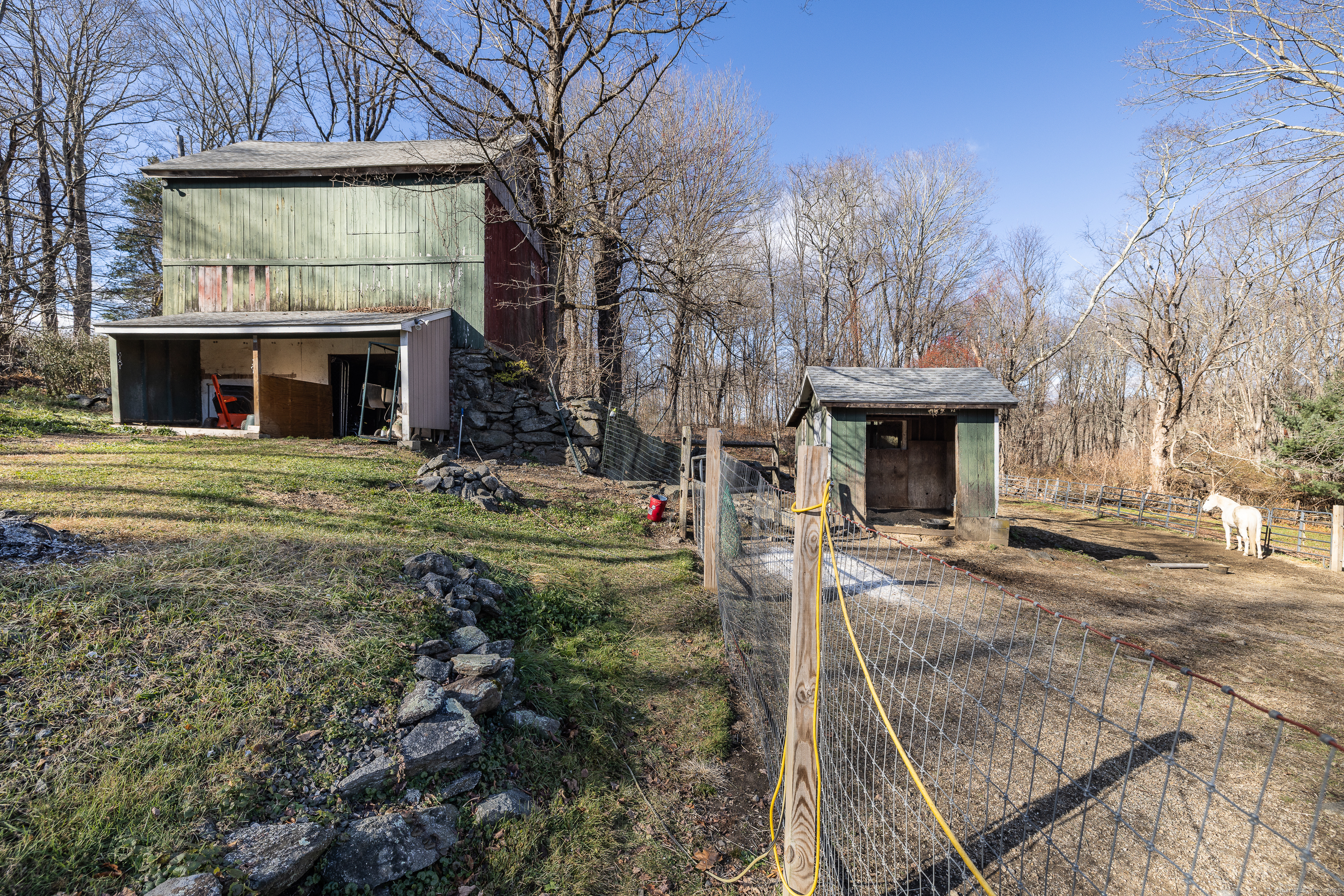2 Stony Brook Road Newtown, CT 06470 - Photo 26 of 29 a front view of a house with garden