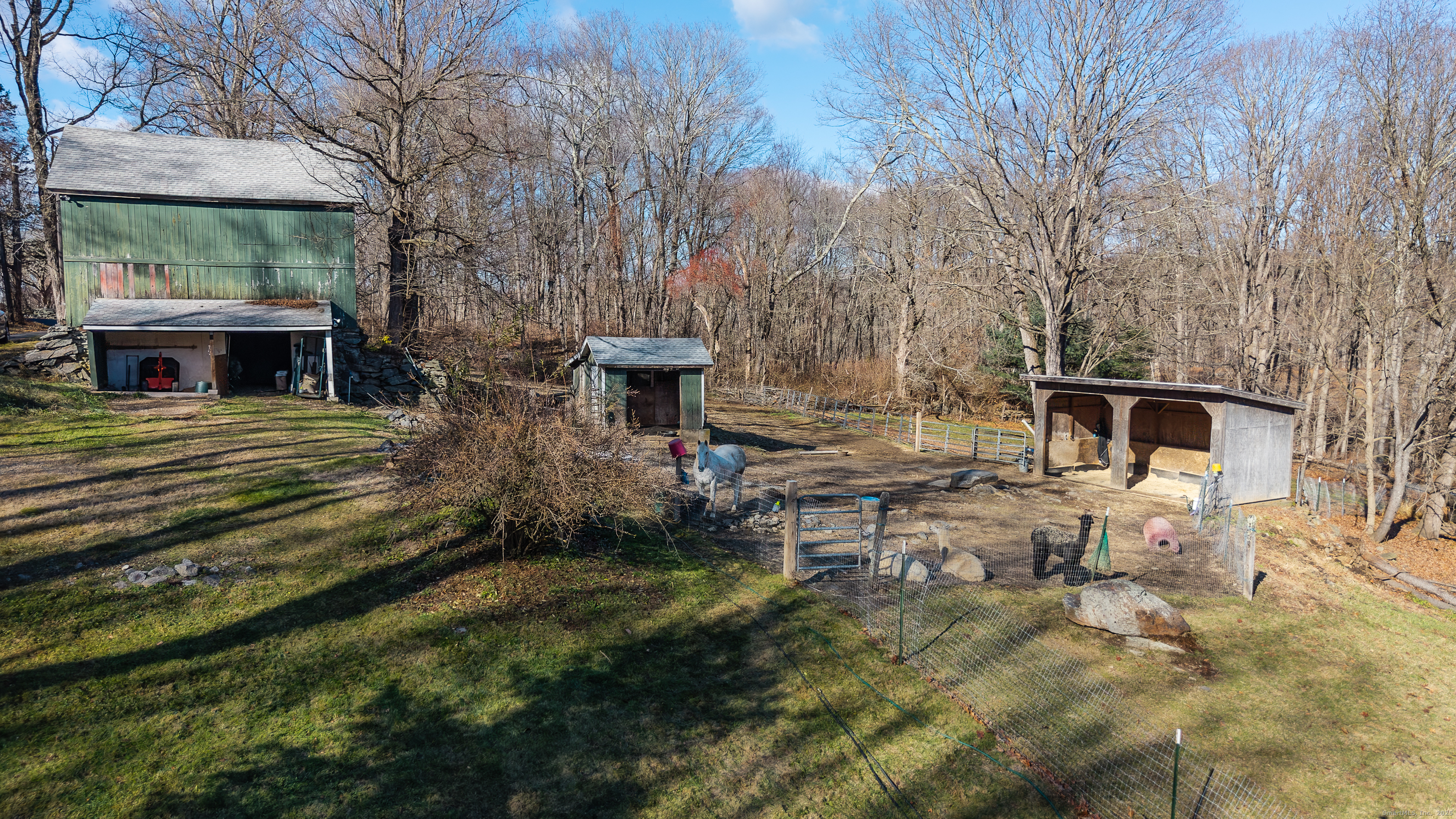 2 Stony Brook Road Newtown, CT 06470 - Photo 29 of 29 a view of a backyard with sitting area
