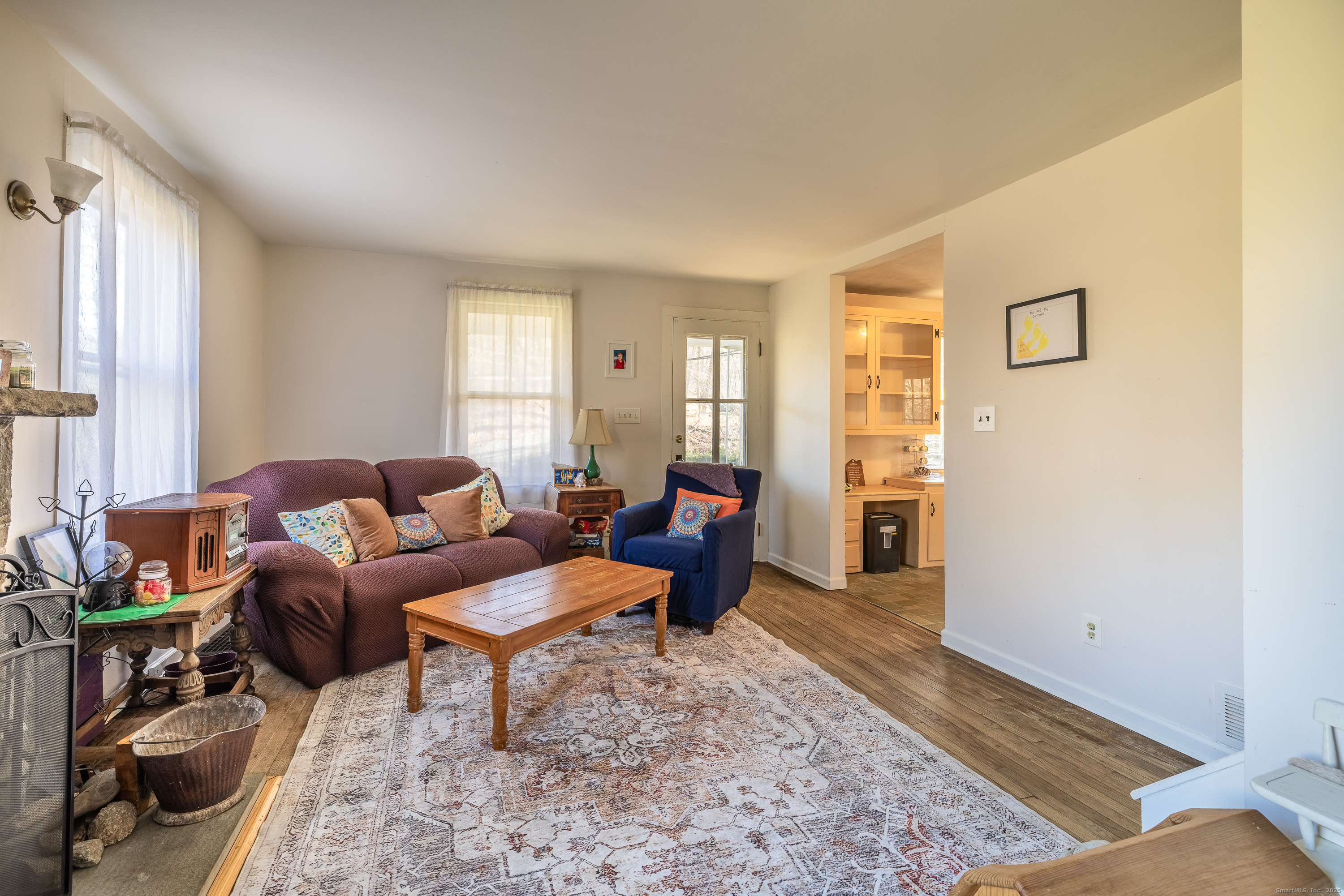 2 Stony Brook Road Newtown, CT 06470 - Photo 7 of 29 a living room with furniture and a rug