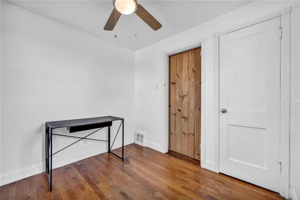 a bathroom with a sink a toilet and bathtub