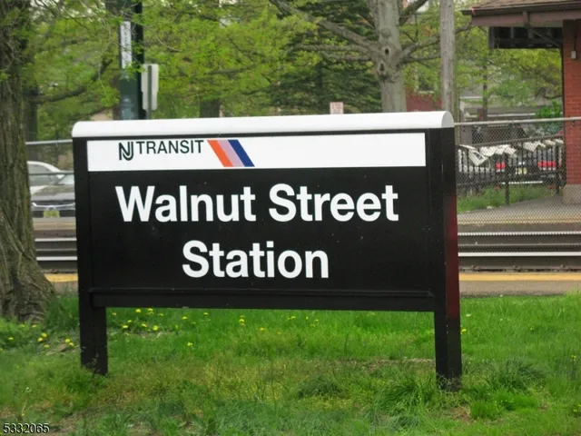 a view of outdoor space with sign board and garden